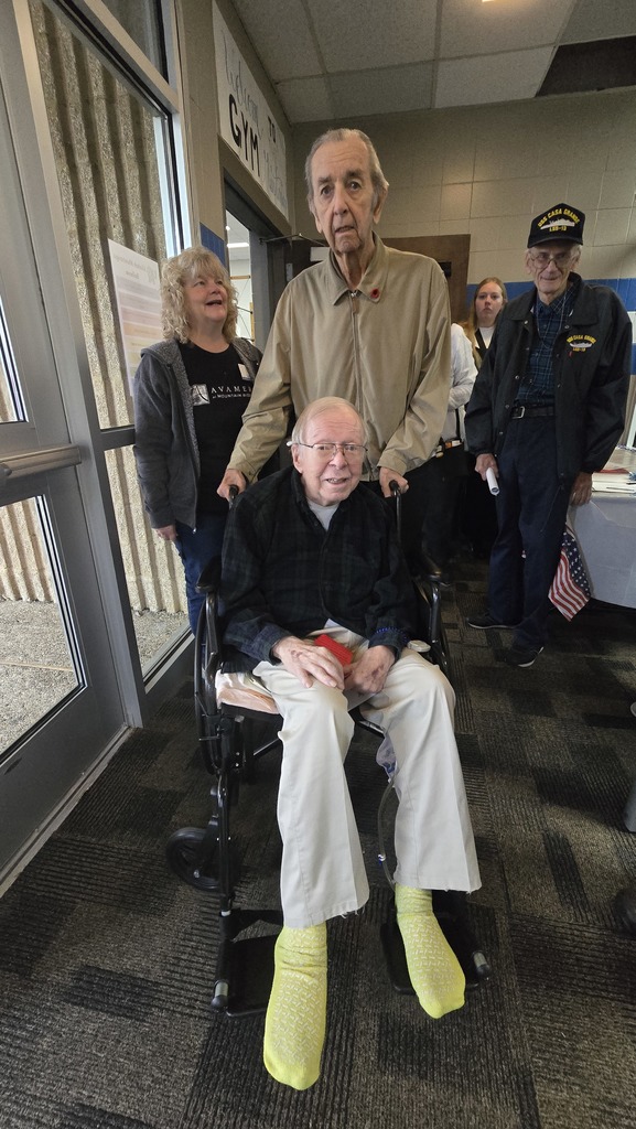US Veterans standing in the hallway.