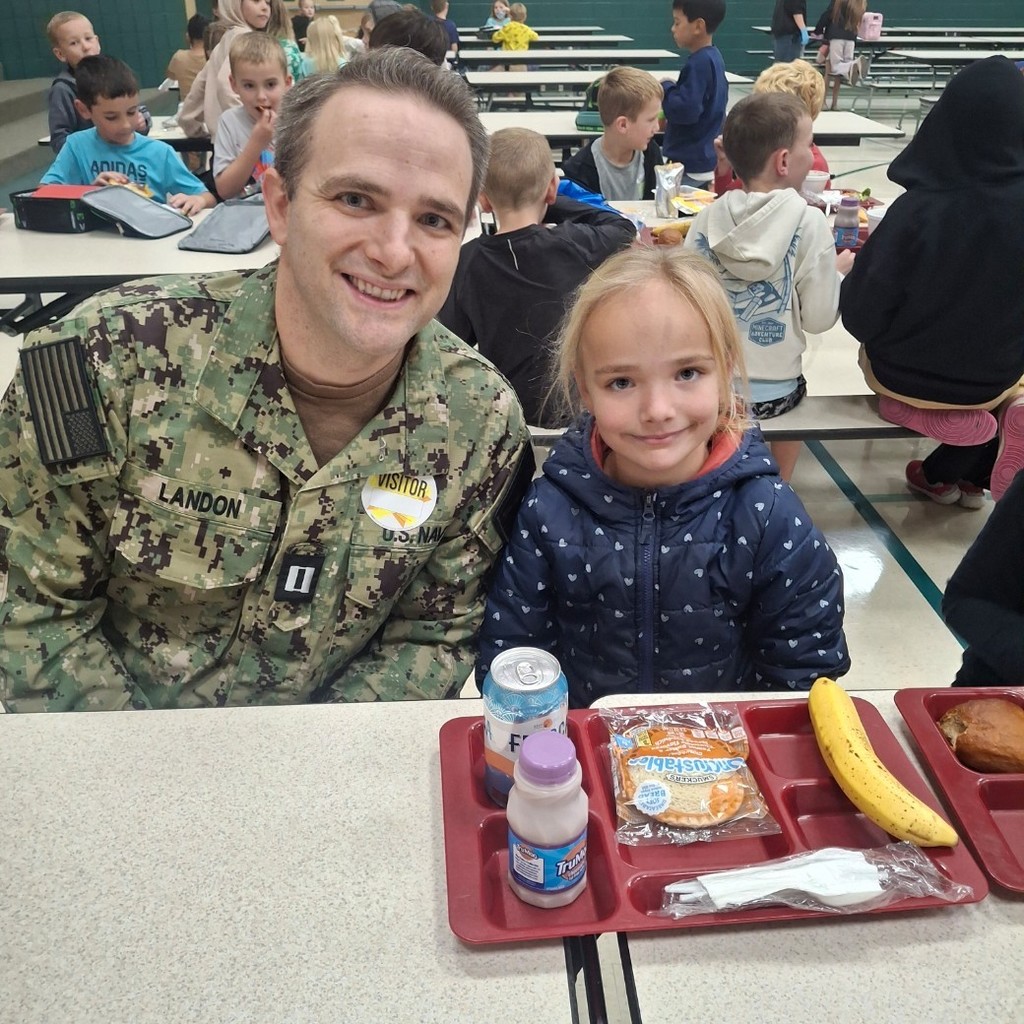 girl with her veteran father