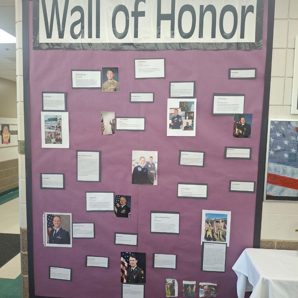 Wall of Honor with photos of veterans and their stories