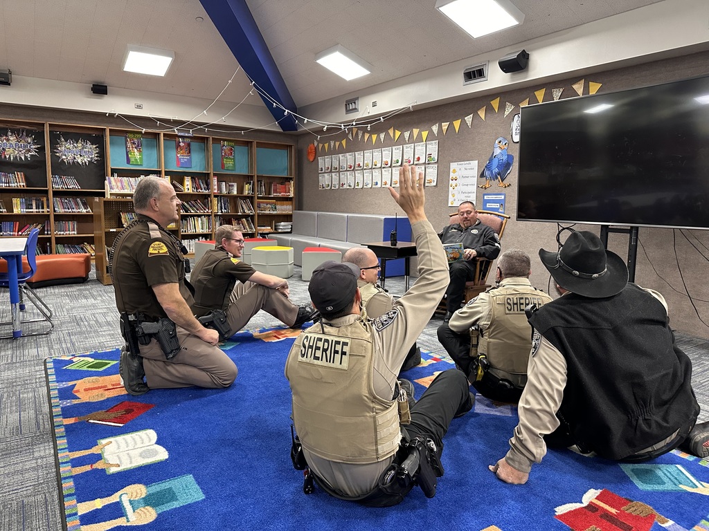 We want to give a massive shoutout to the Sheriff's Department for helping us with our mock lockdown today. They truly care about our Falcons' safety! The best part? After the drill, these heroes traded in their gear for books in the library!