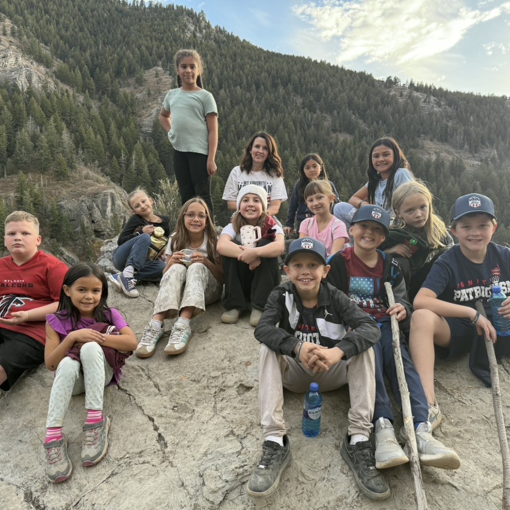 Kids on top of the mountain