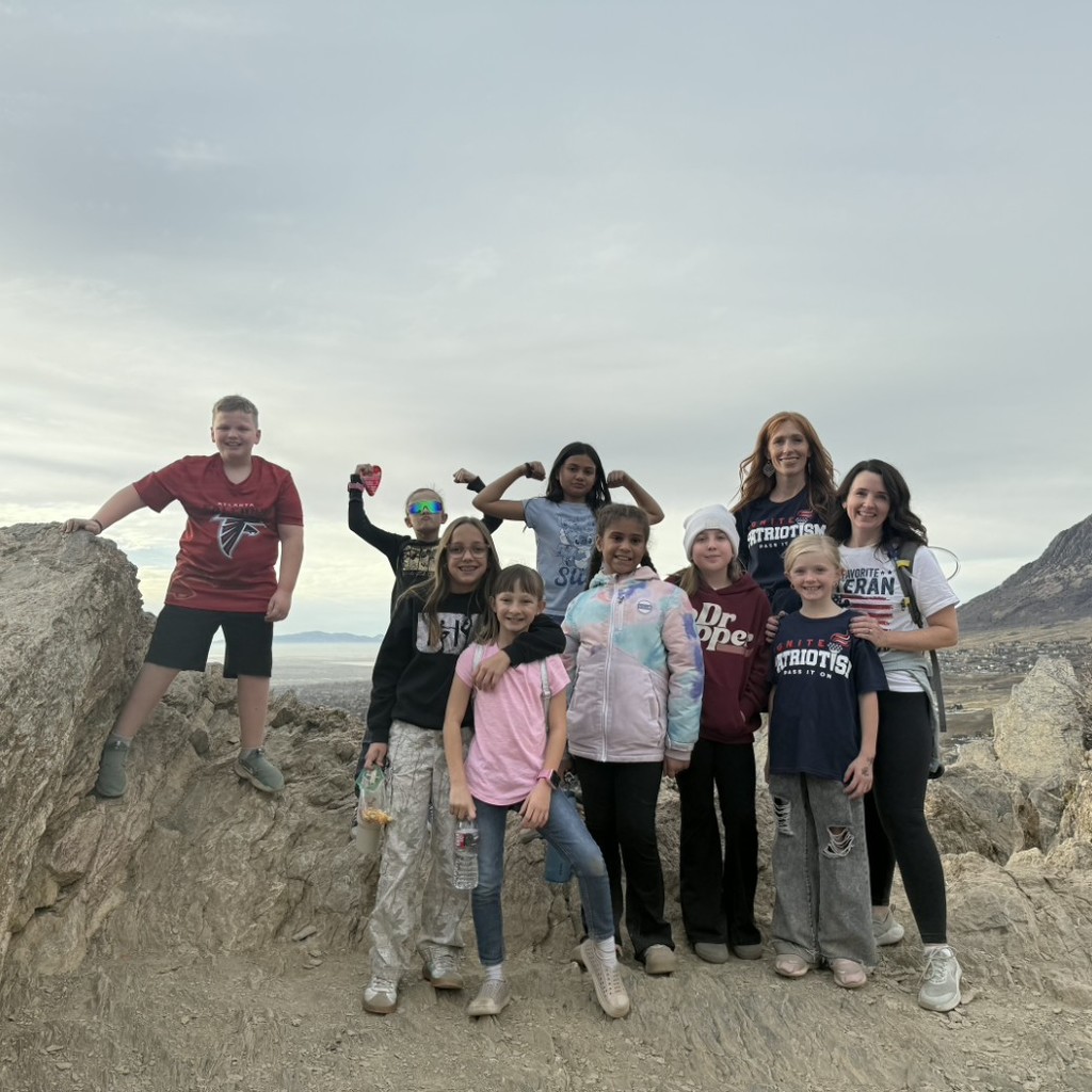 Kids on top of the mountain