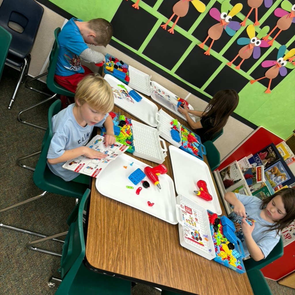 Kids playing with toy tools