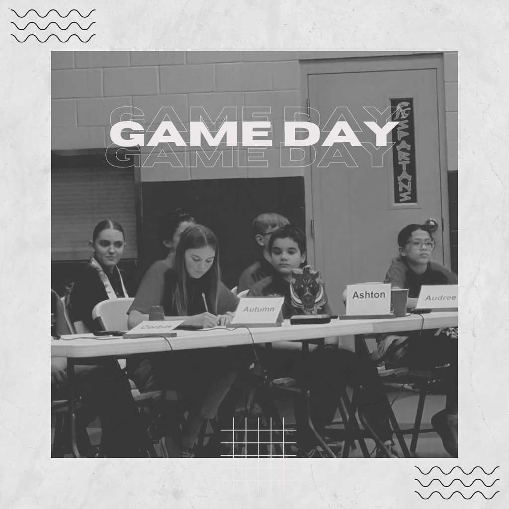 photograph of nal team during a game. game day written over it