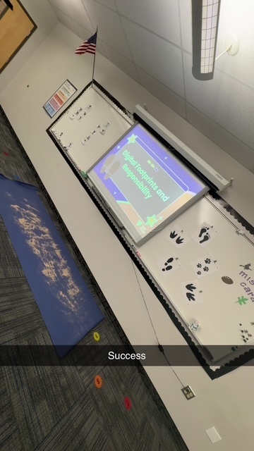 Digital footprints and responsibilities activity and sand on the ground in the computer lab