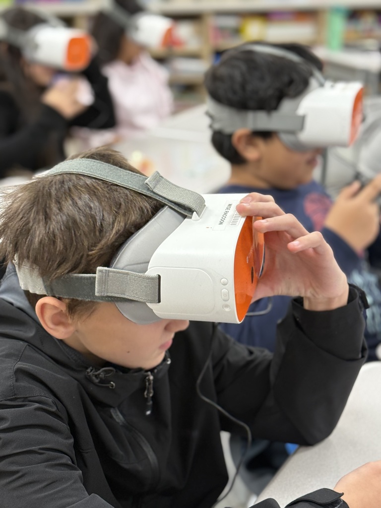 students wearing a VR headset