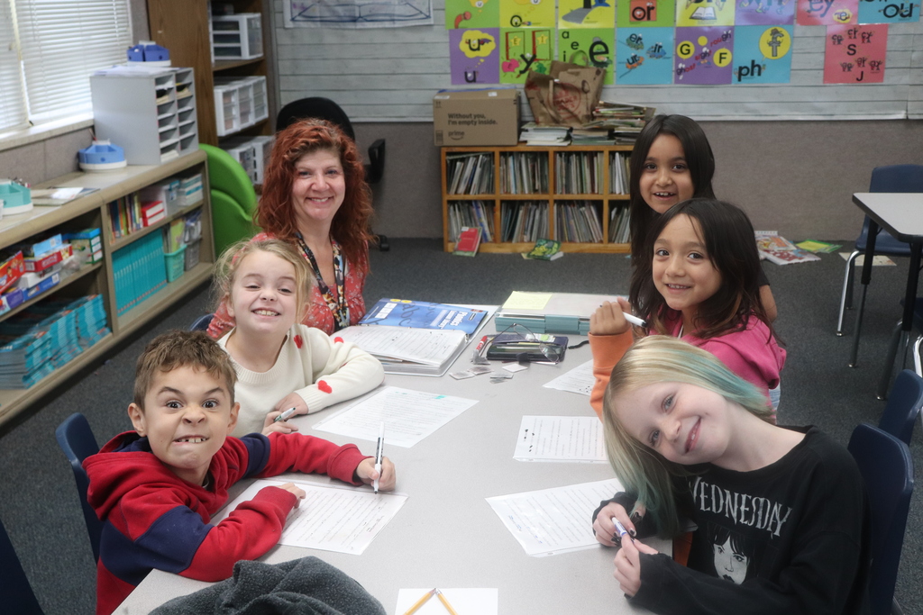 Aides helping students