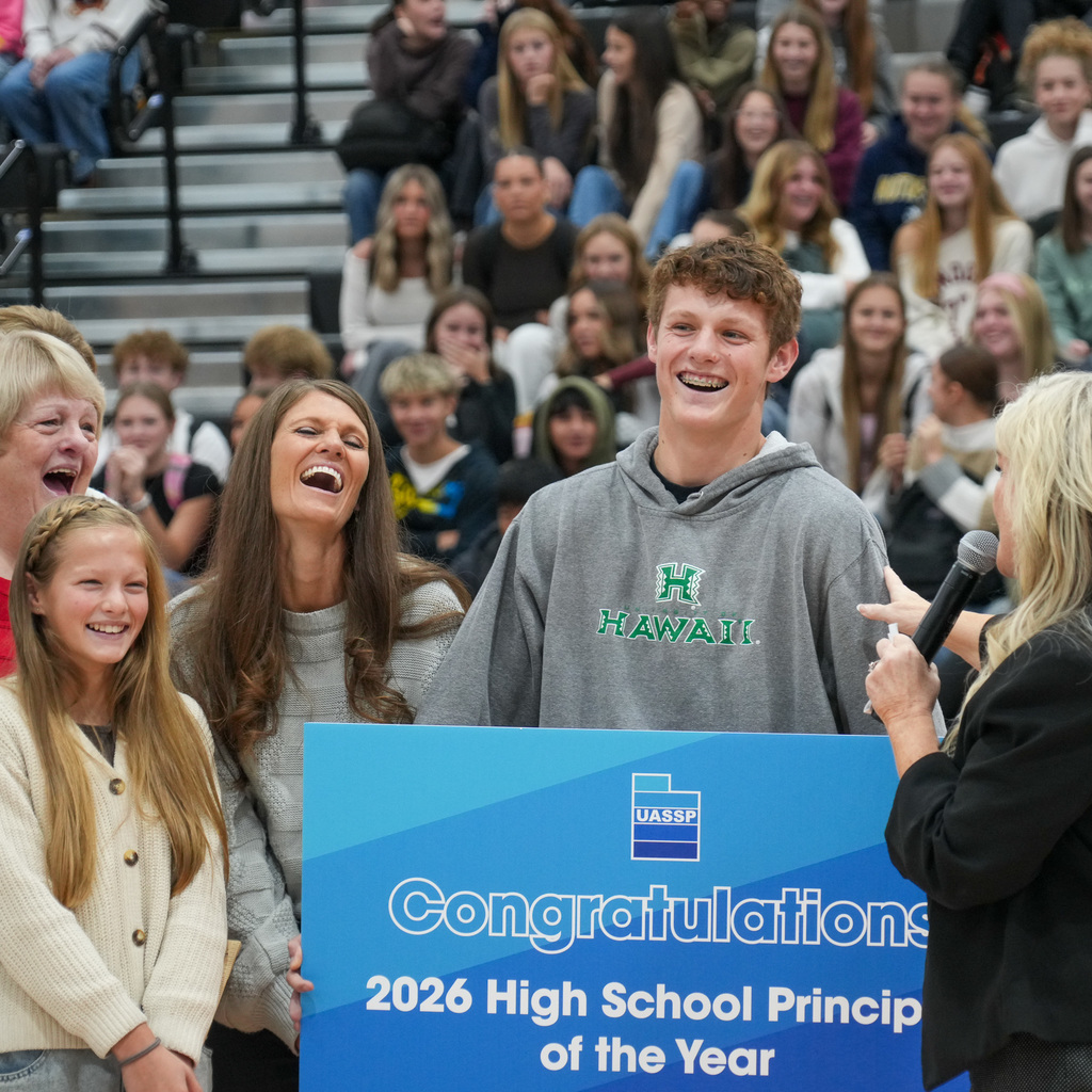Mr. Martini's family  in front of student assembly
