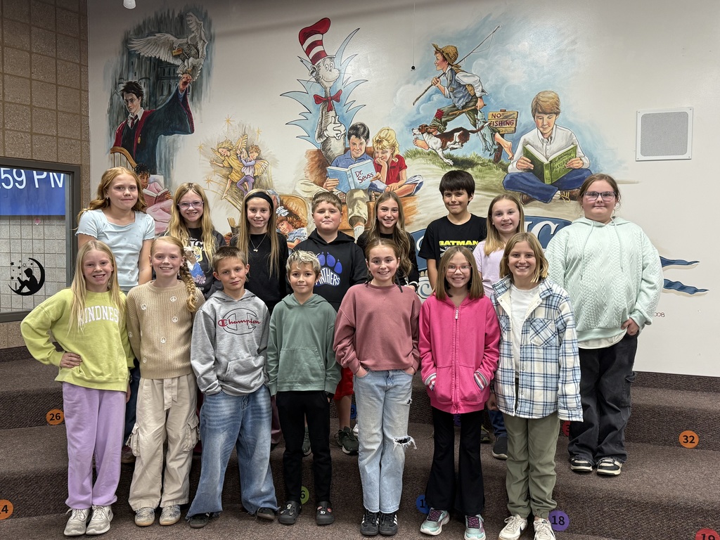Group of students standing and smiling