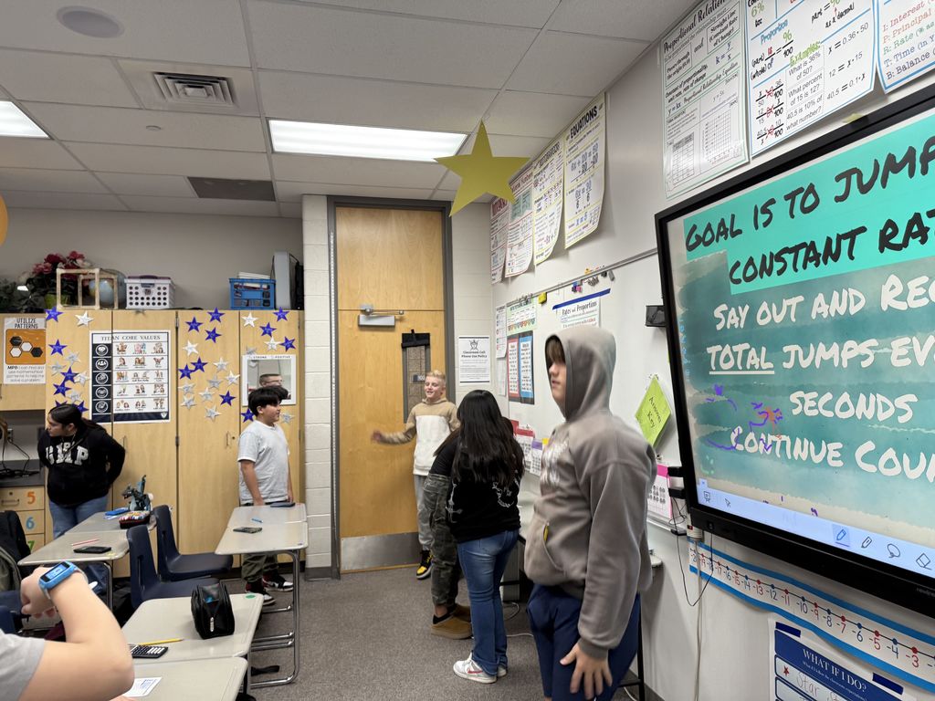 Demonstrating Constant of Proportionality while graphing jumping jacks