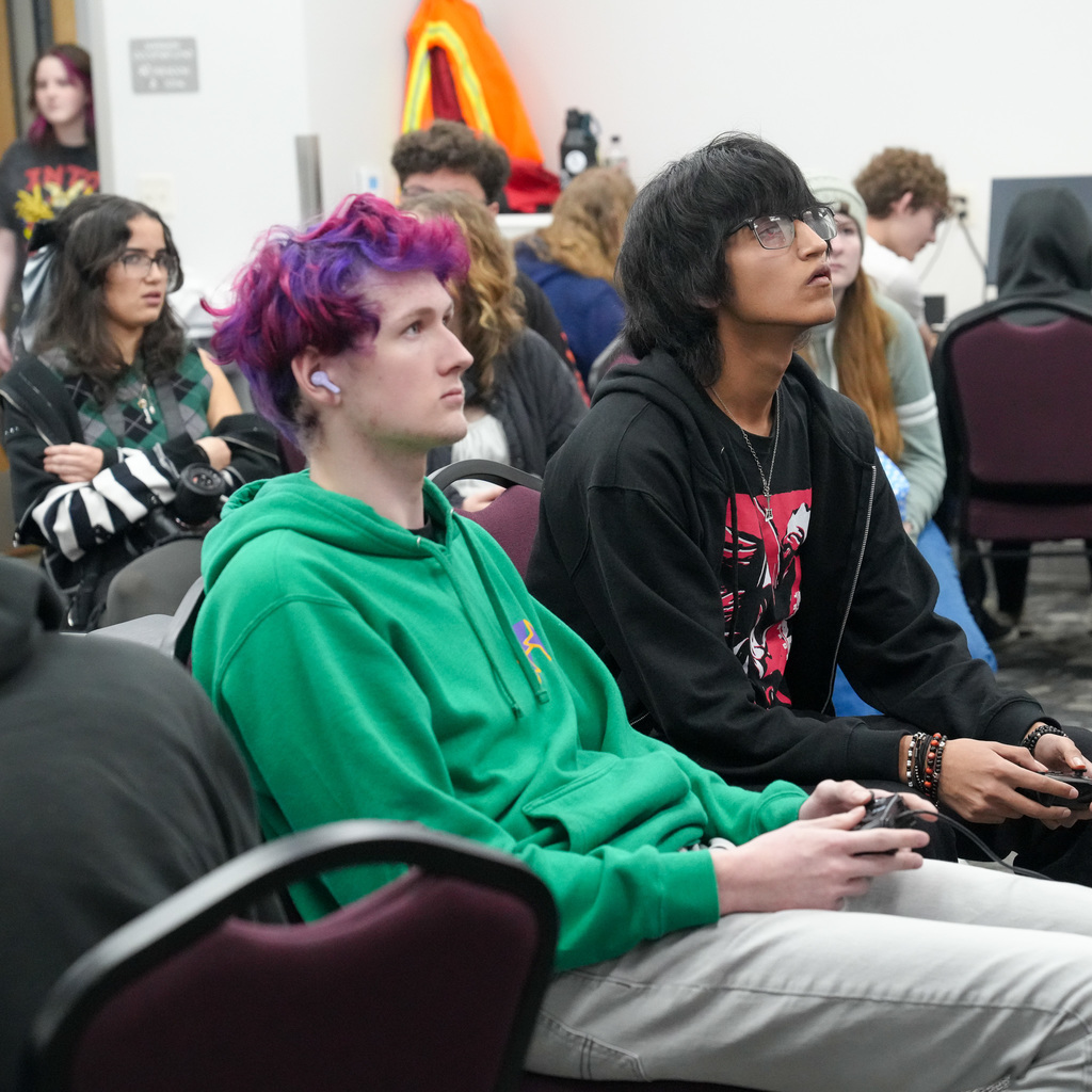 E-sports competitors playing games