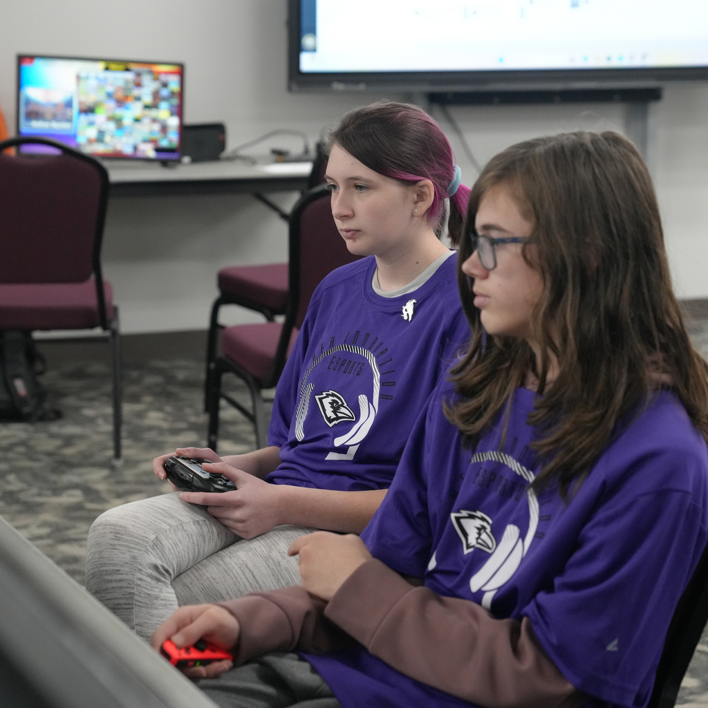 E-sports competitors playing games