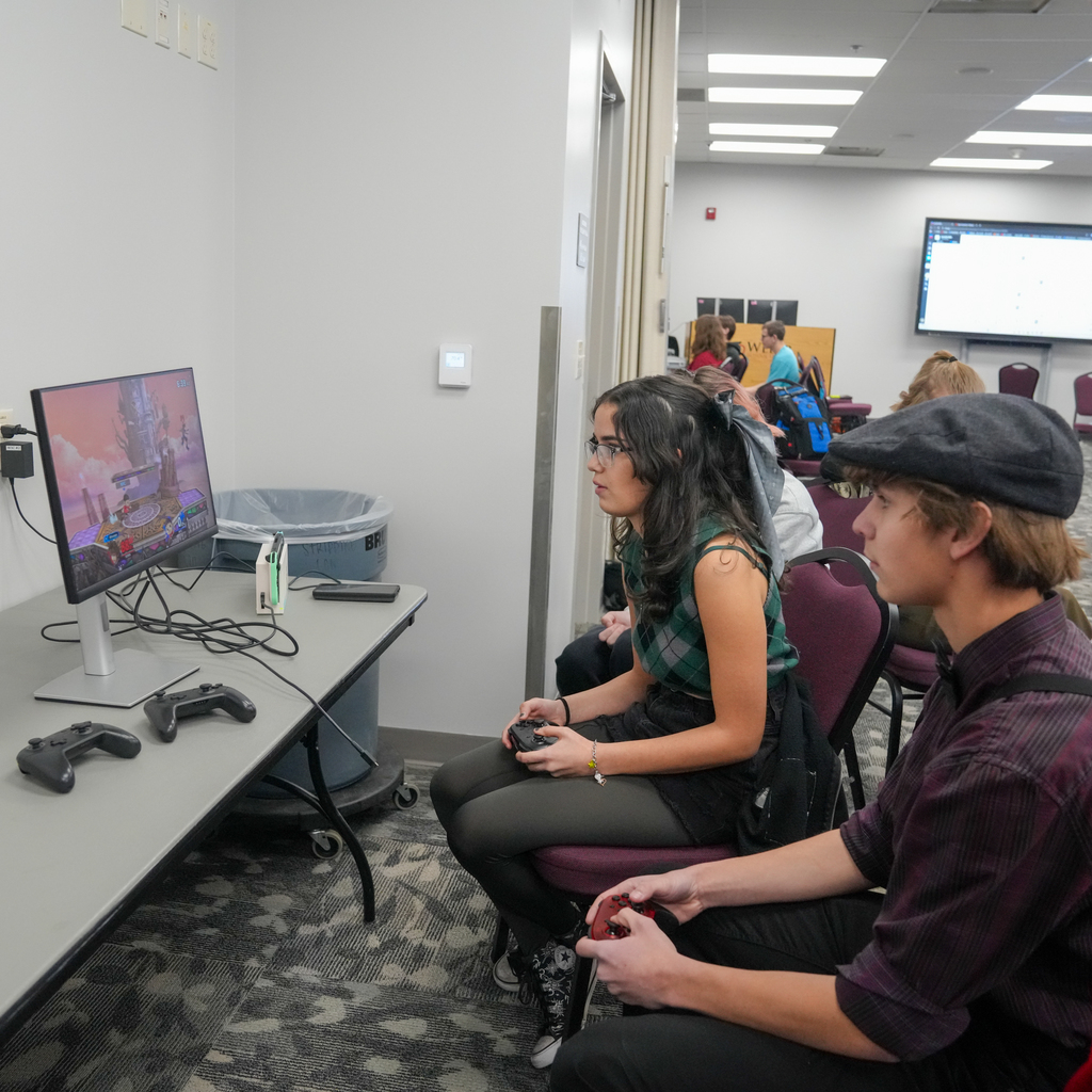 E-sports competitors playing games