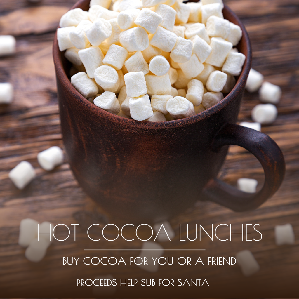 photo of a cup of hot chocolate. Hot cocoa lunches. Buy cocoa for you or a friend . Proceeds help sub for santa