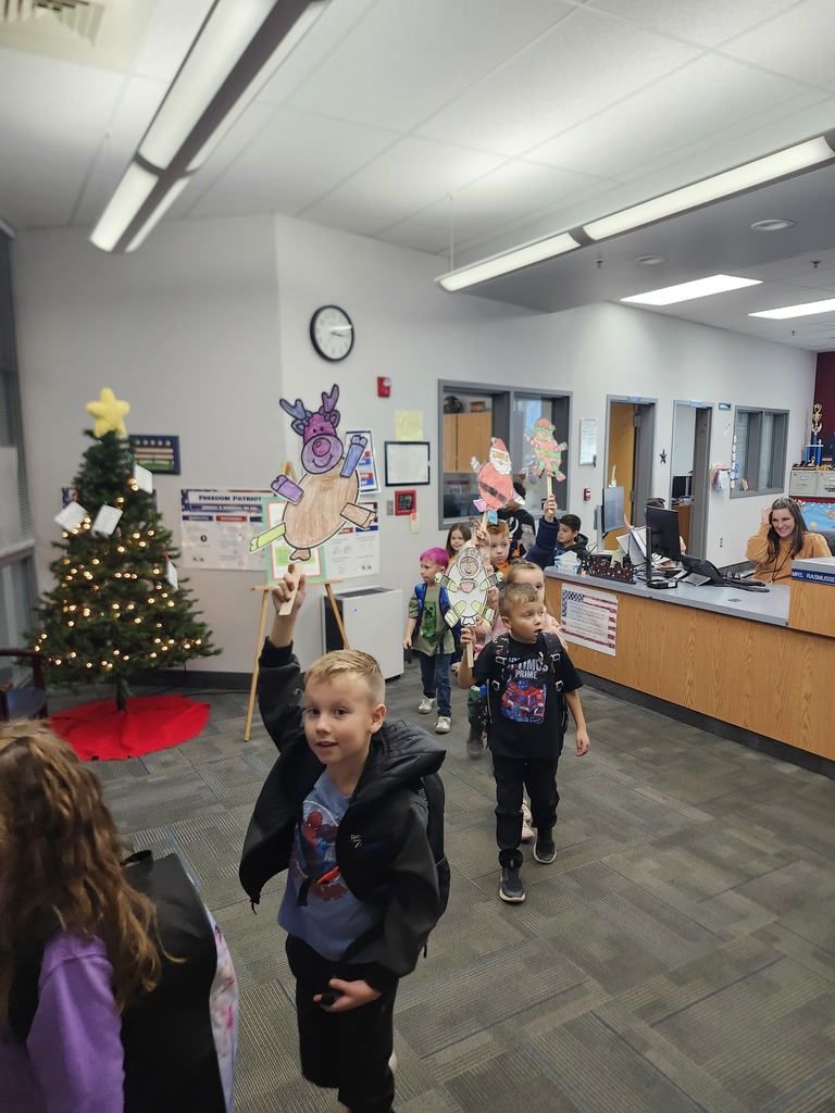 Kindergarten Thanksgiving day parade. So fun. They made the cutest balloon floats out of paper. 