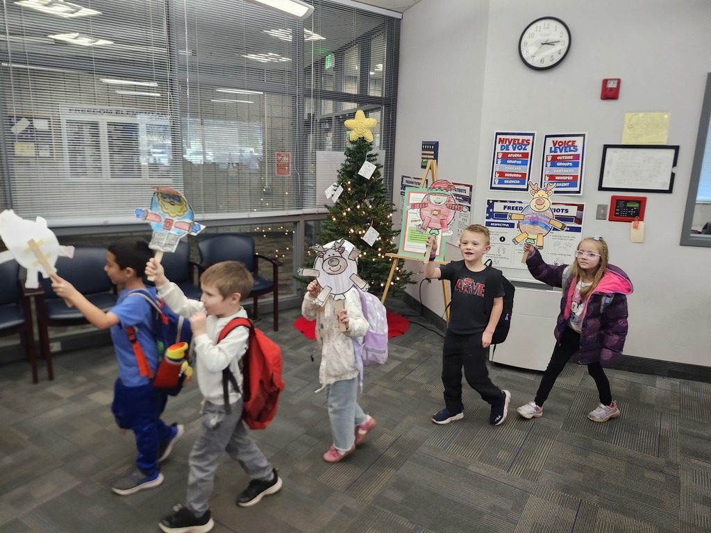 Kindergarten Thanksgiving day parade. So fun. They made the cutest balloon floats out of paper. 