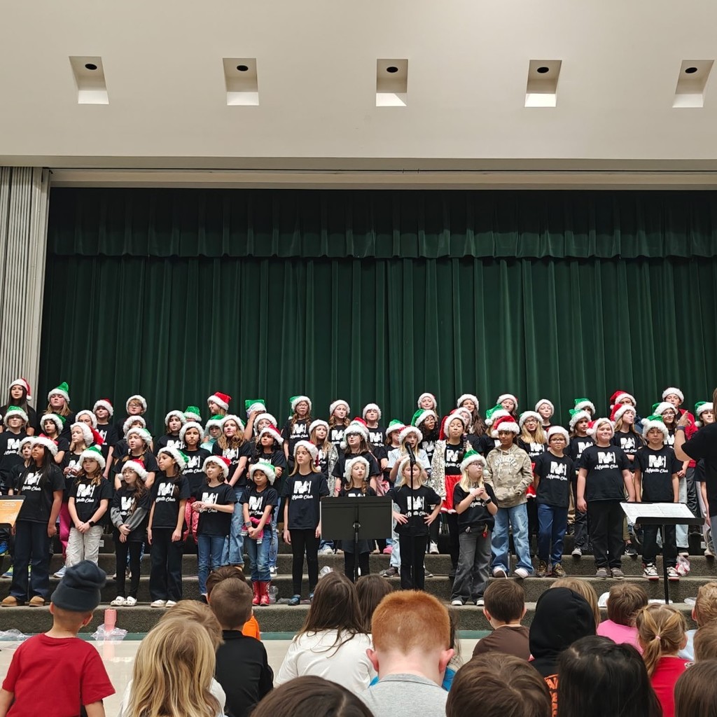 Majestic choir students in Santa hats