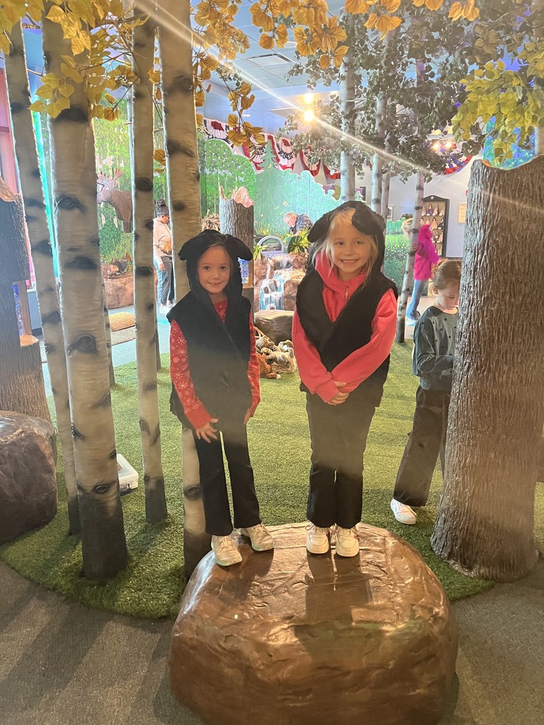 Students act out a play in costumes