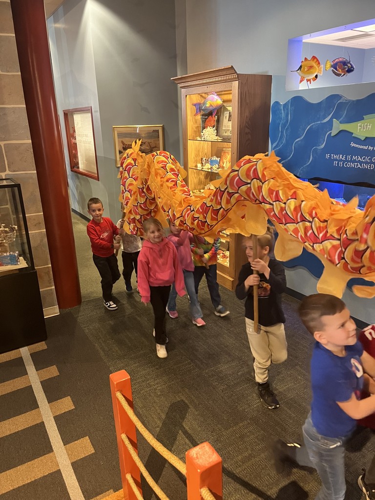 Students act out a play in costumes