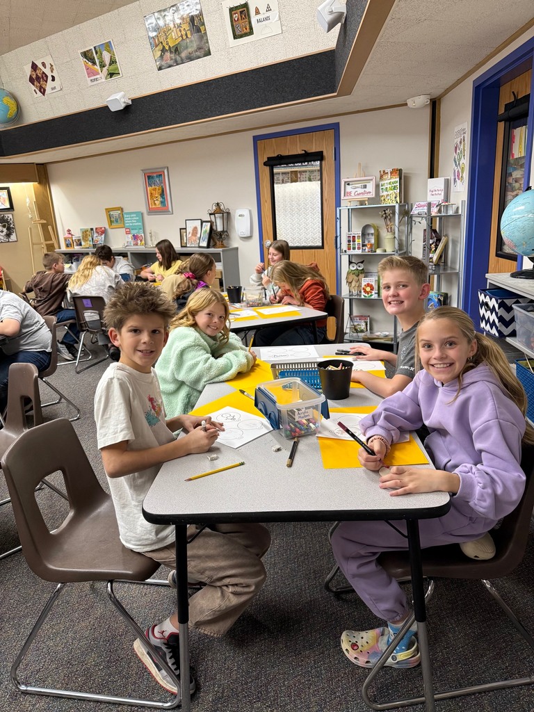 students in art making ornaments