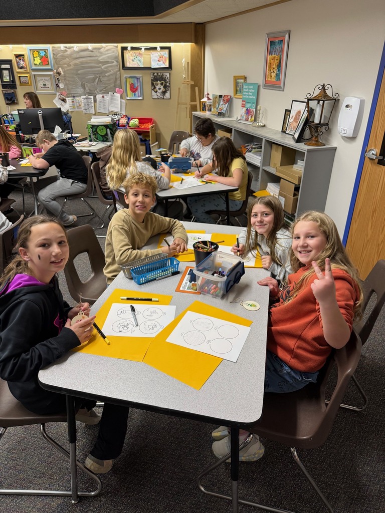 students in art making ornaments