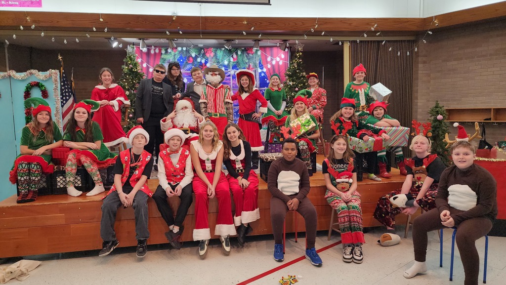 6th grade play participants posing for camera