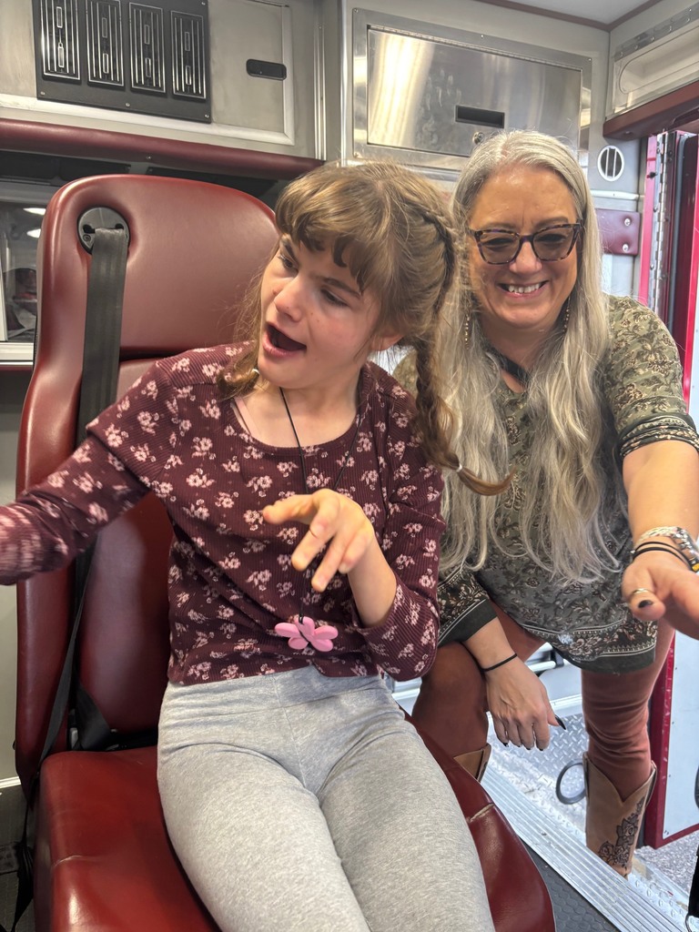 Trying out a seat in the fire truck