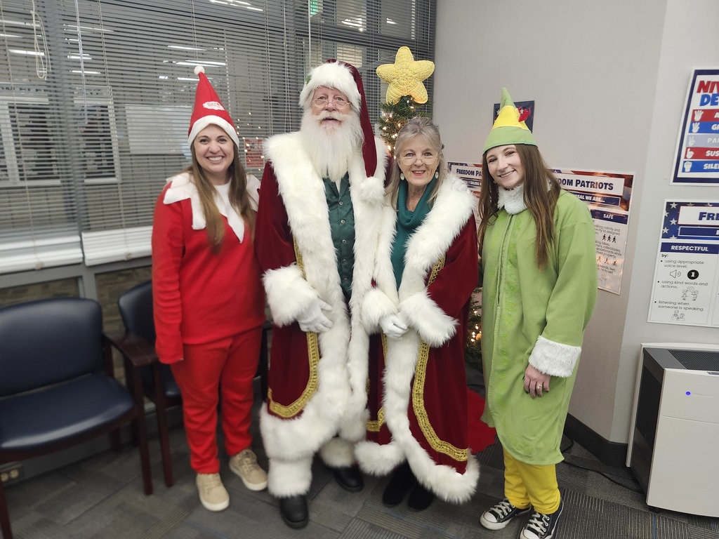Santa, Mrs. Claus, and the Elves