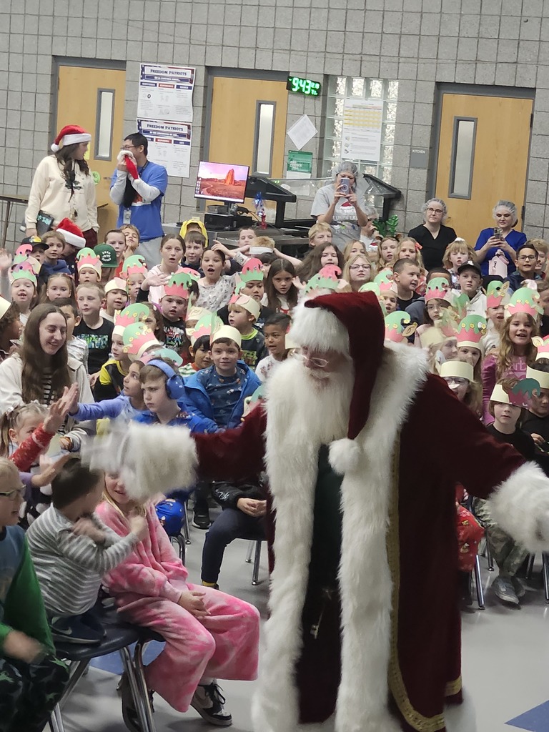 Santa Claus getting all the kids excited during the Assembly