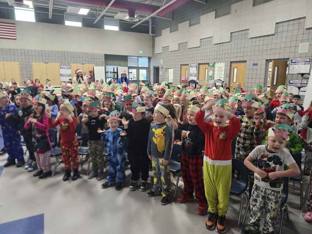 1st grade singing their song during the Assembly
