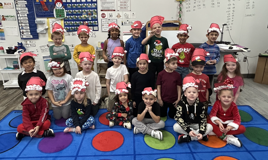 kindergarten students with santa hats