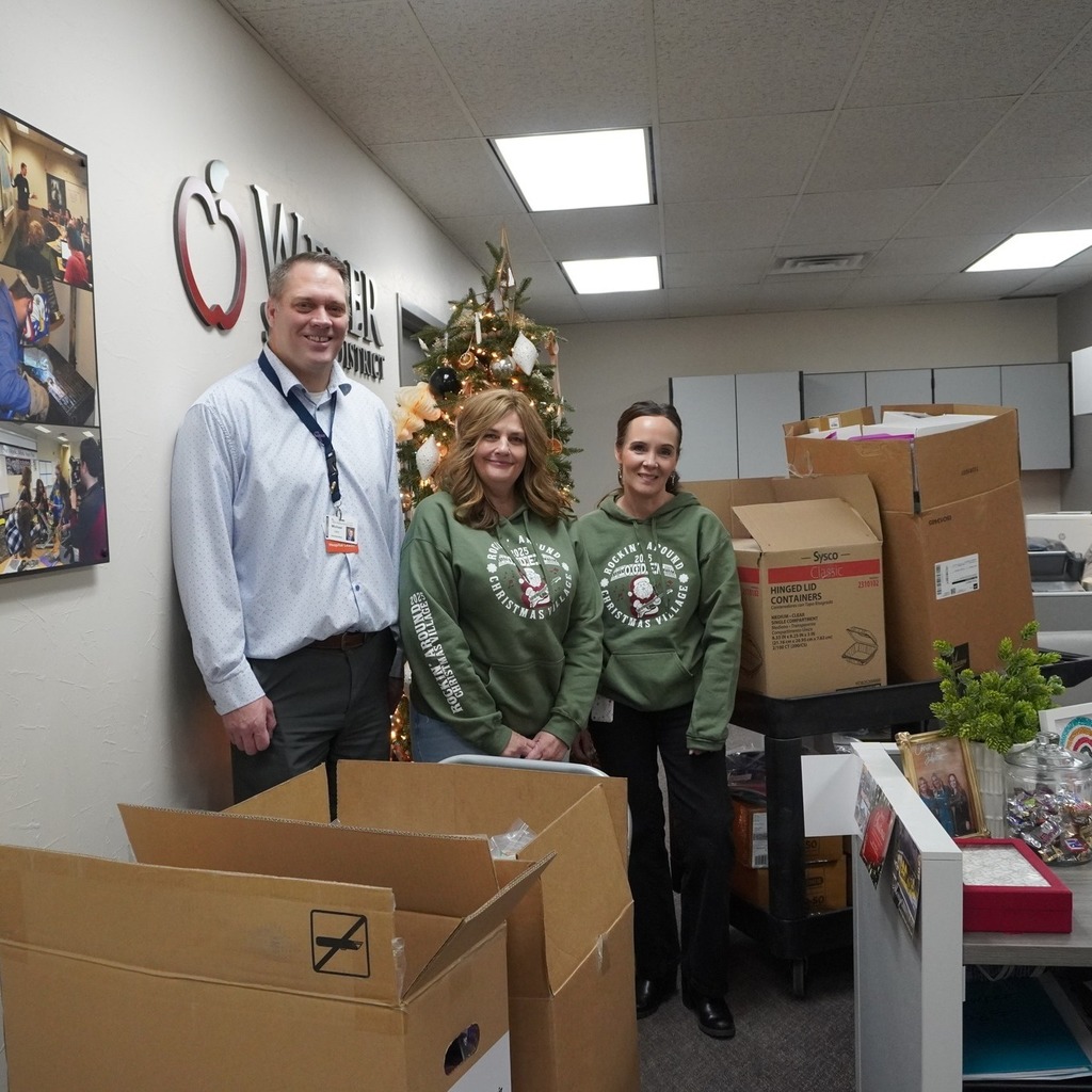 Mike Hale of Ogden Regional Medical Center and the food packs, hygiene kits, and school supplies that they graciously donated