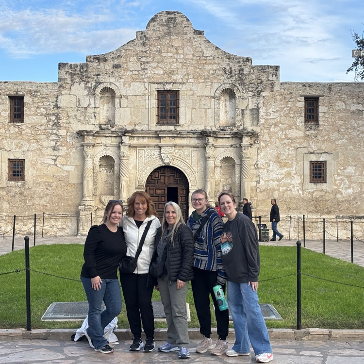 ( people standing in front of the Alamo