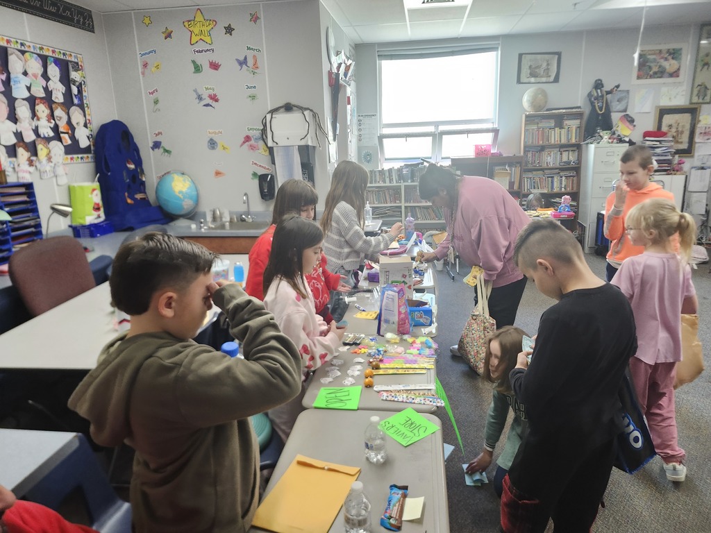 3rd Grade Market Day, kids were buying and selling treats and toys and games with their class money