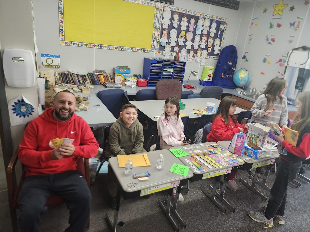 3rd Grade Market Day, kids were buying and selling treats and toys and games with their class money
