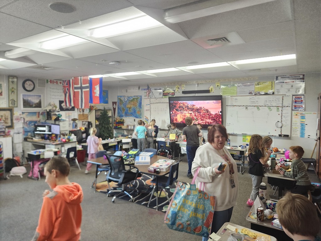 3rd Grade Market Day, kids were buying and selling treats and toys and games with their class money