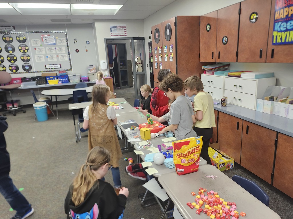 3rd Grade Market Day, kids were buying and selling treats and toys and games with their class money