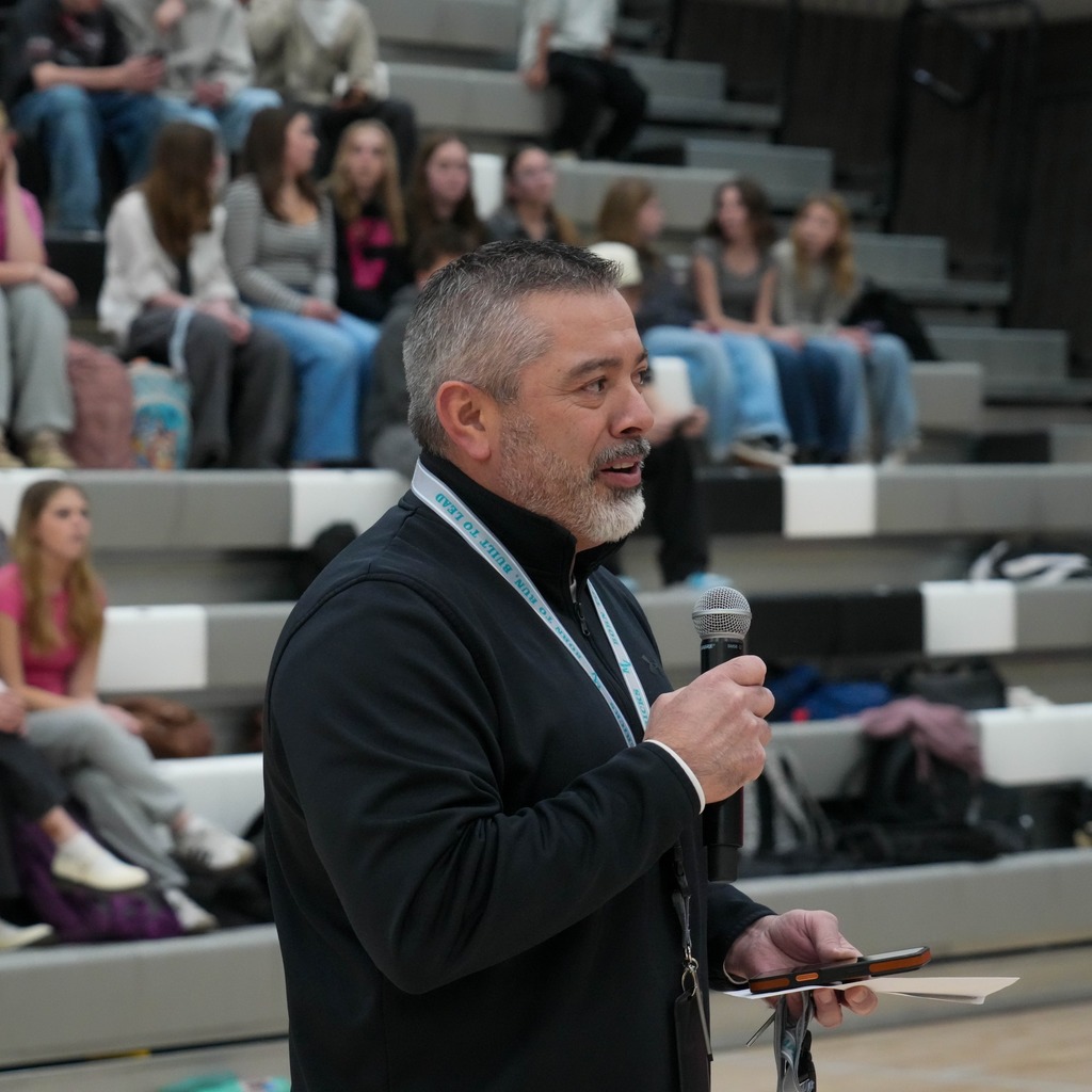 Christmas box house student donations half time presentation presenter.