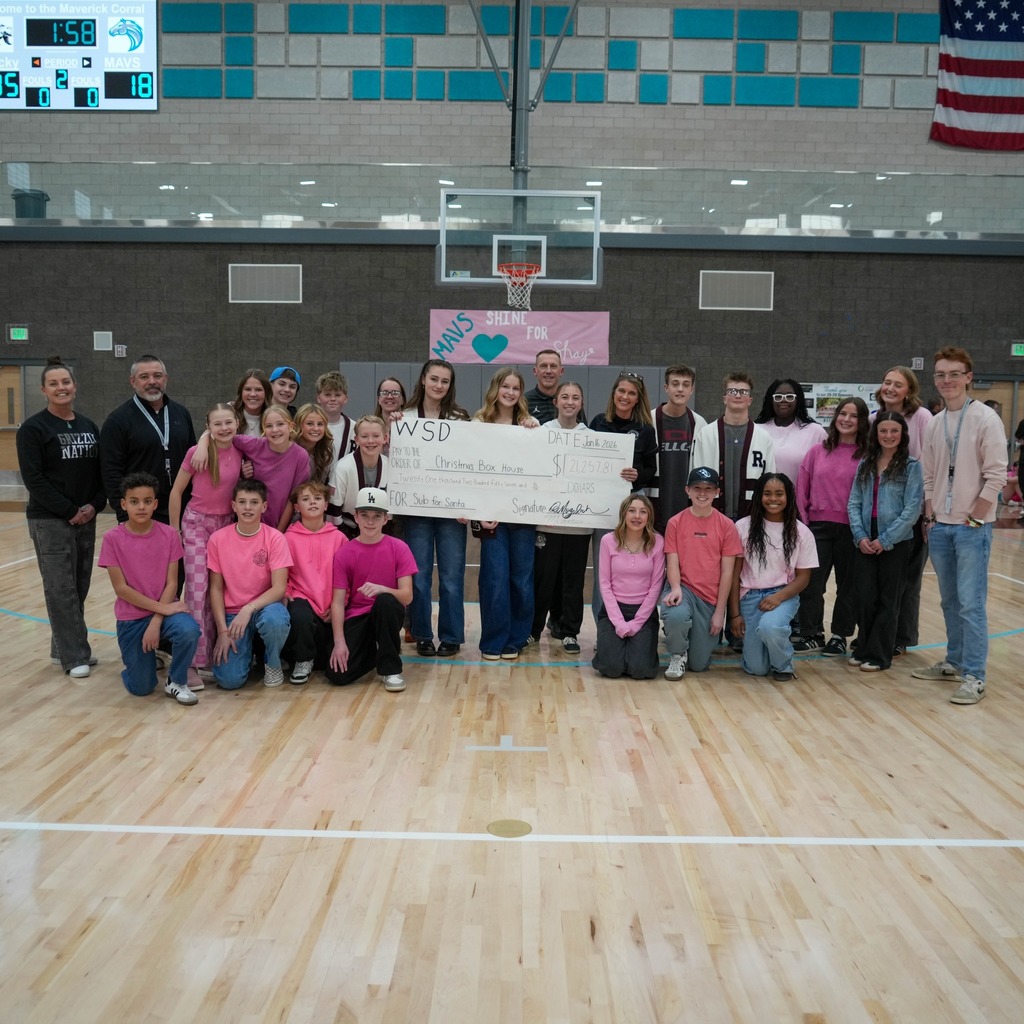 Christmas box house student donations half time presentation group.