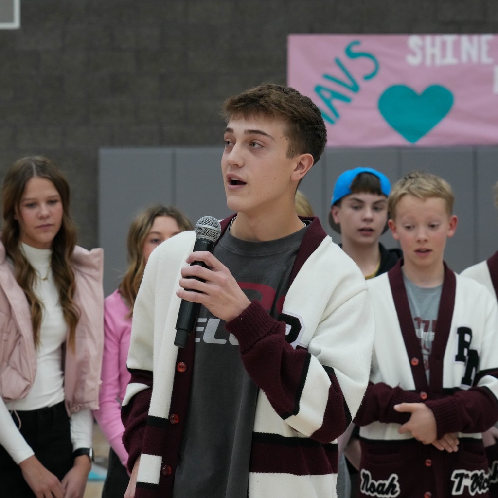 Christmas box house student donations half time presentation presenter.