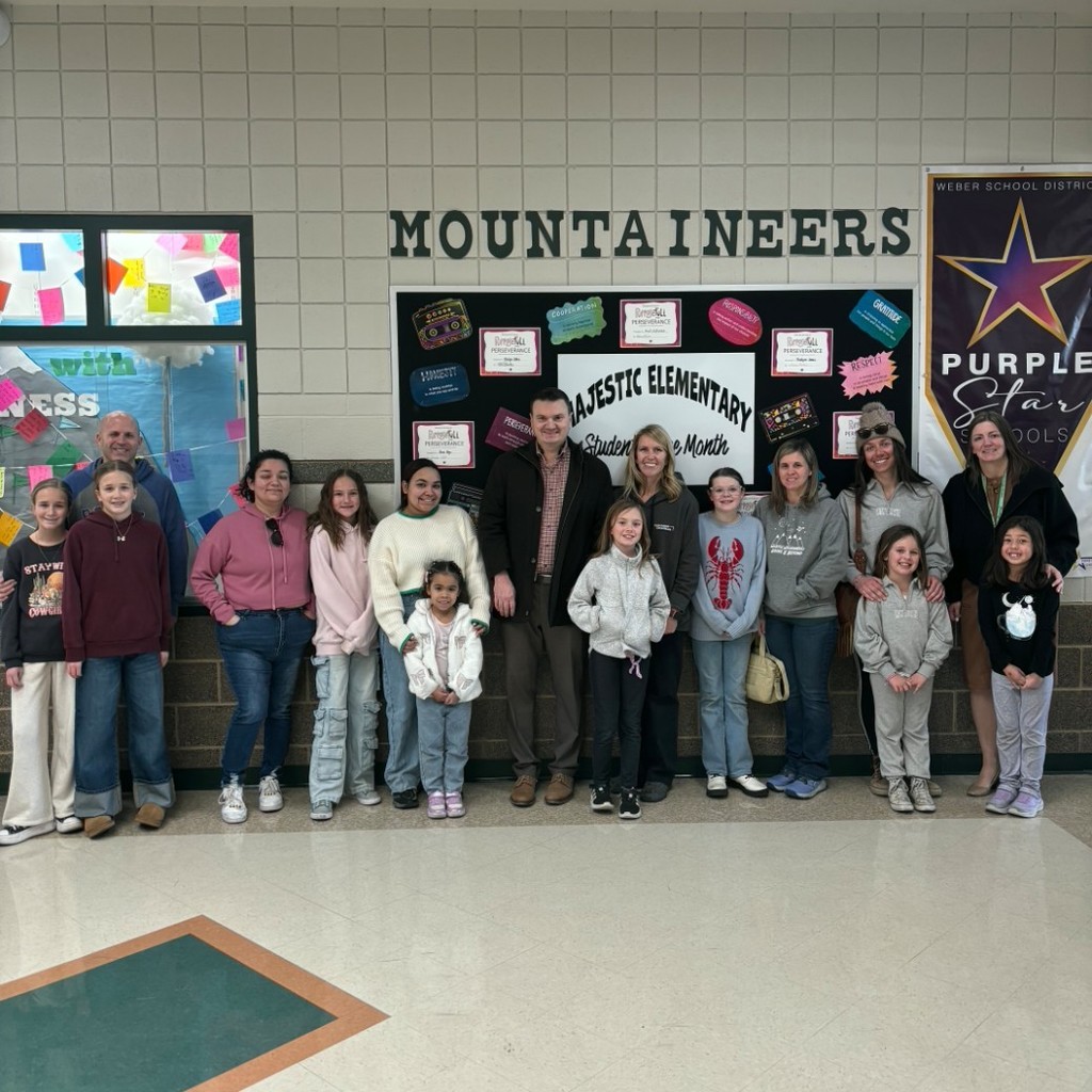 Students of the month and their parents.