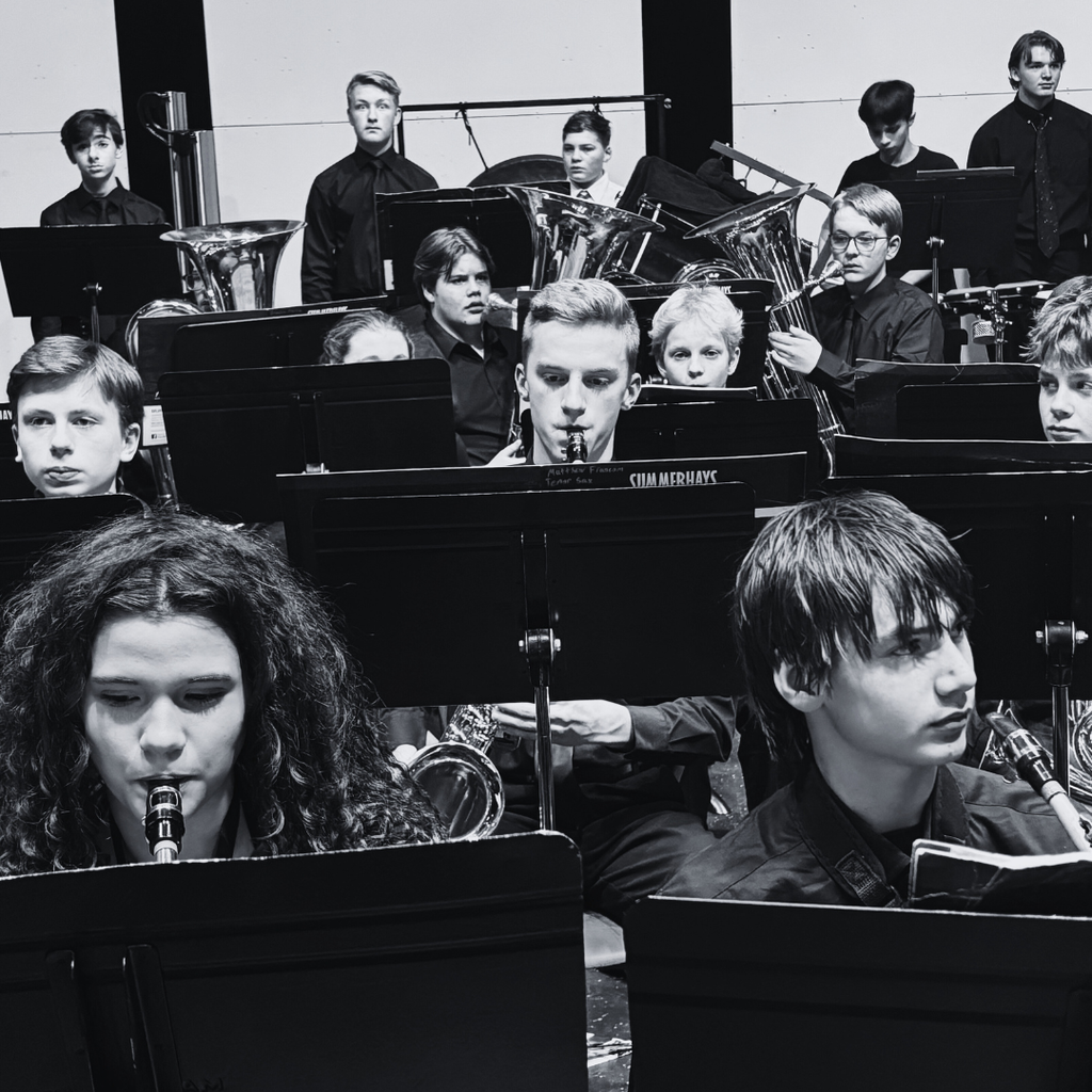 photographs of roy jr students at the district honor band performance. 