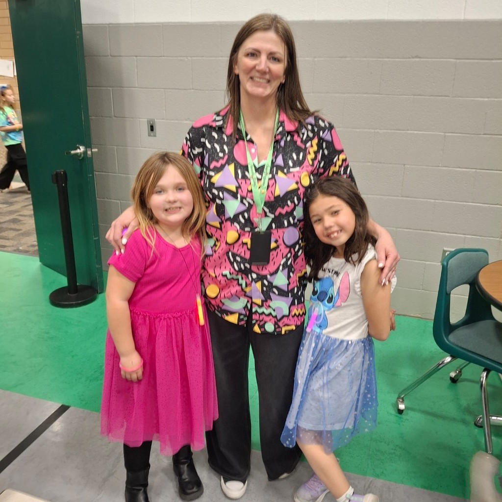 Mrs. Jacobsen with some girls ay the dance