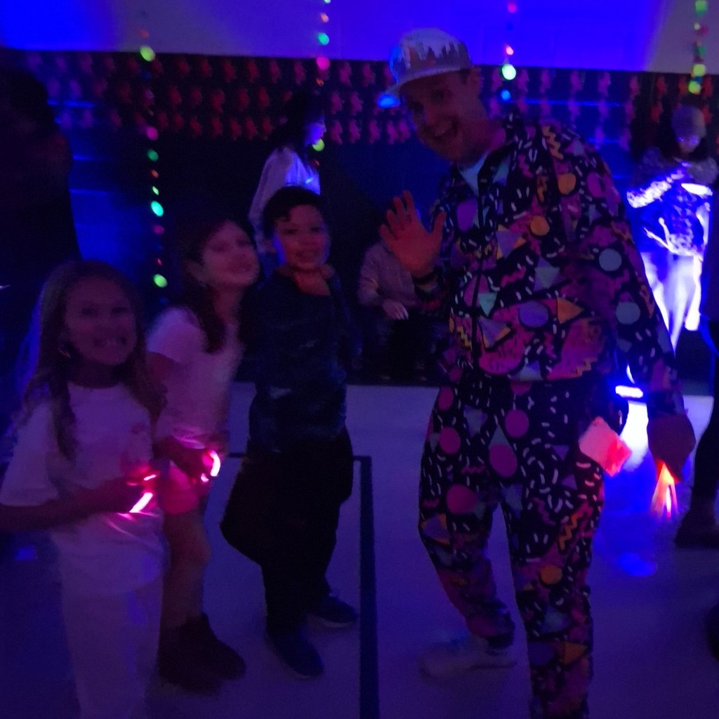 Sr. Findlay with some kids at the dance