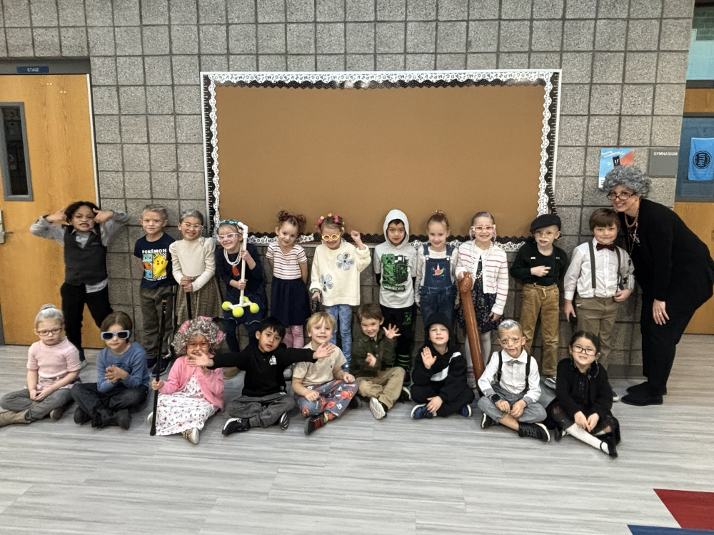 100 Days of School celebration with Kindergarten and first. They Nailed the costumes. Pictures of all the kids parading the halls and enjoying the activities.