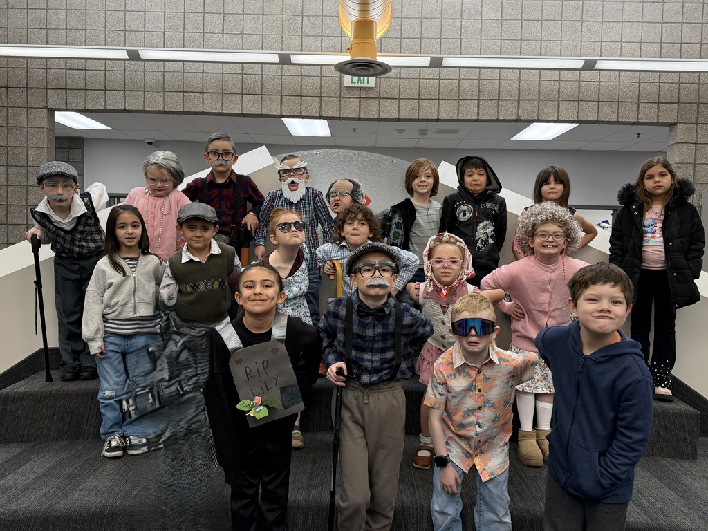 100 Days of School celebration with Kindergarten and first. They Nailed the costumes. Pictures of all the kids parading the halls and enjoying the activities.