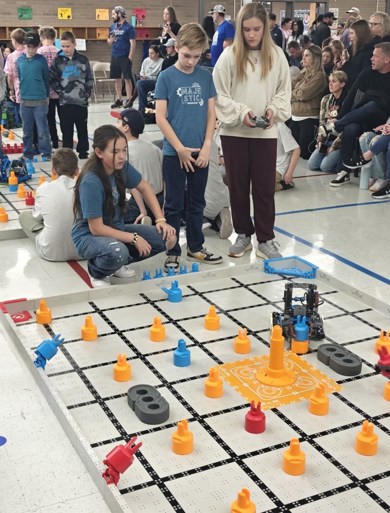 students competing at robotics