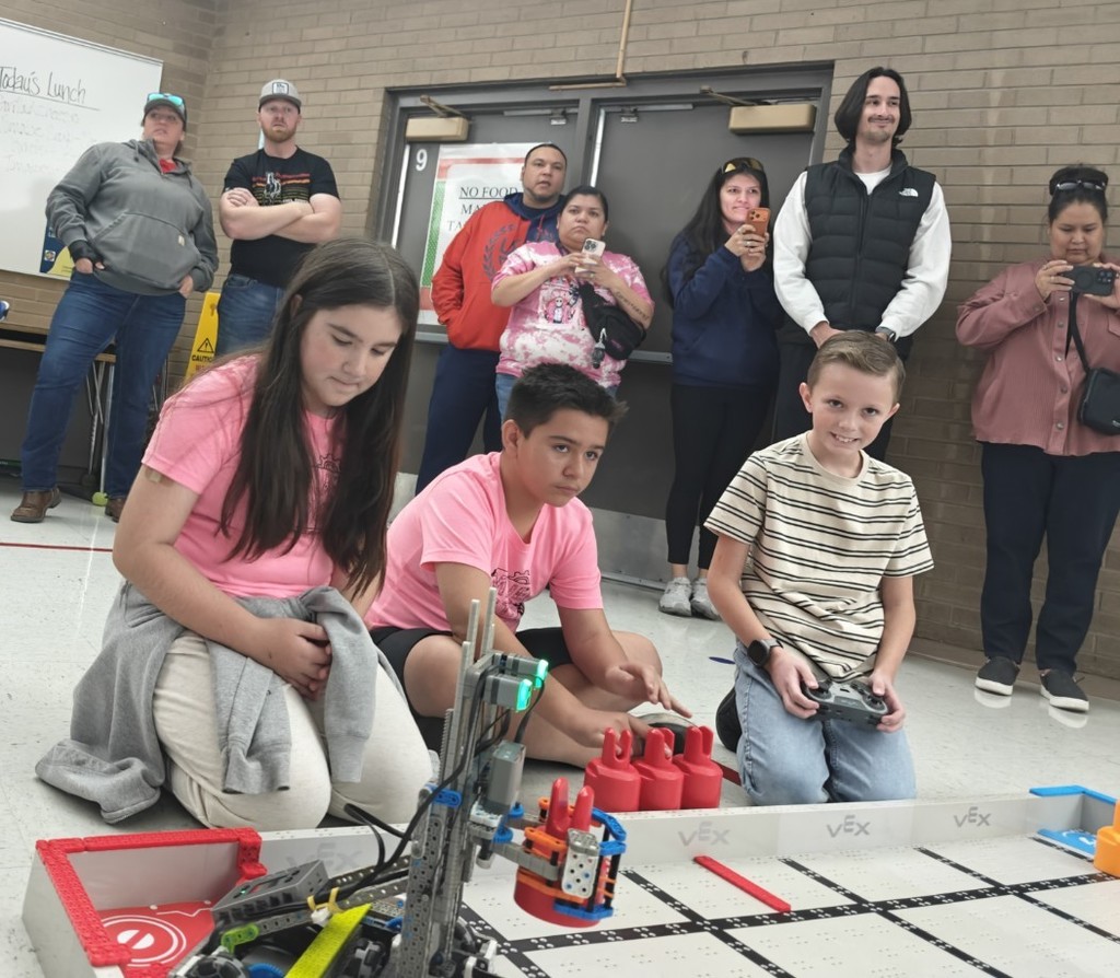 student competing in robotics. 