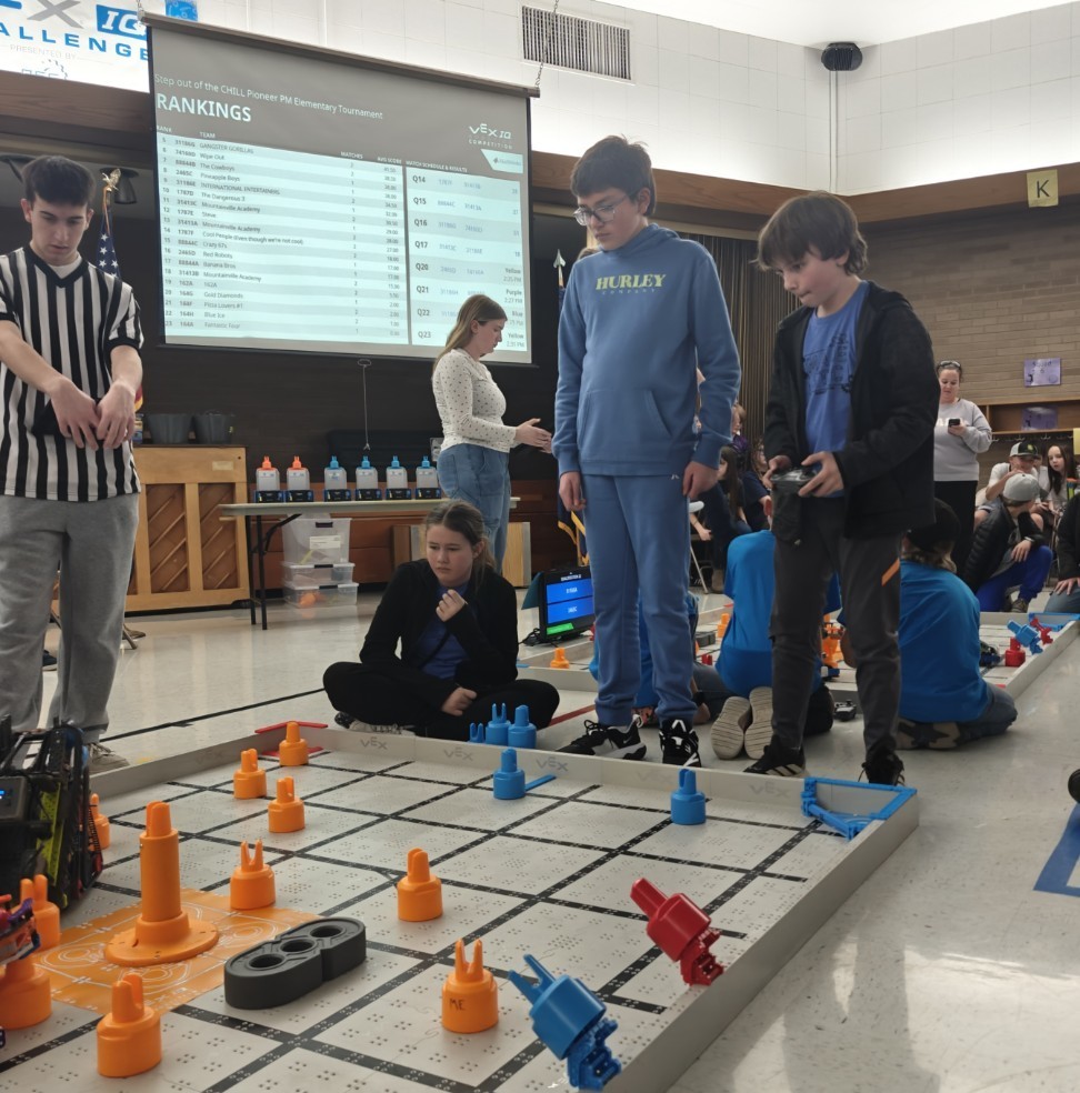 students competing in a robotics event. 