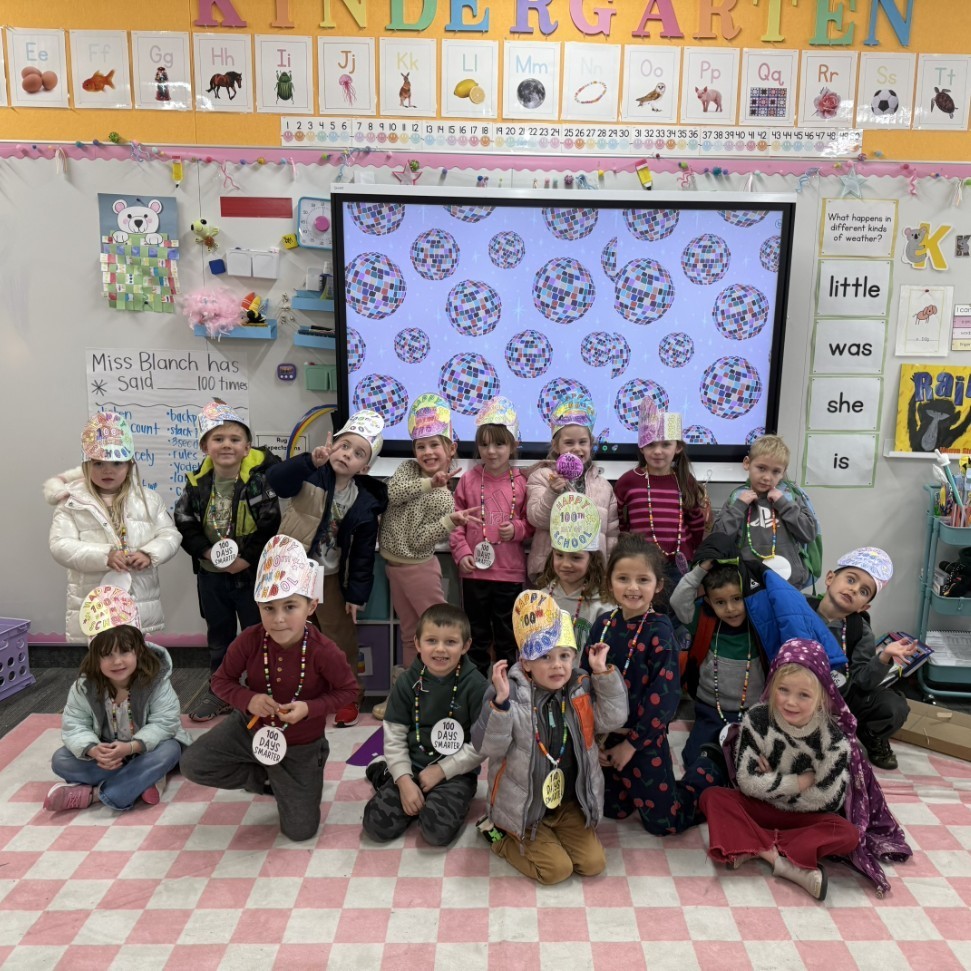 kids smiling in classroom 